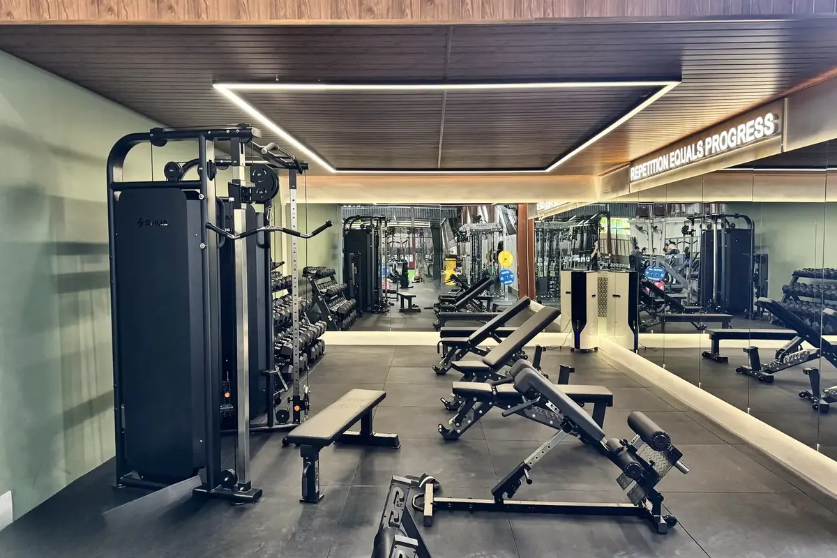 The PT and weights room with machines and benches